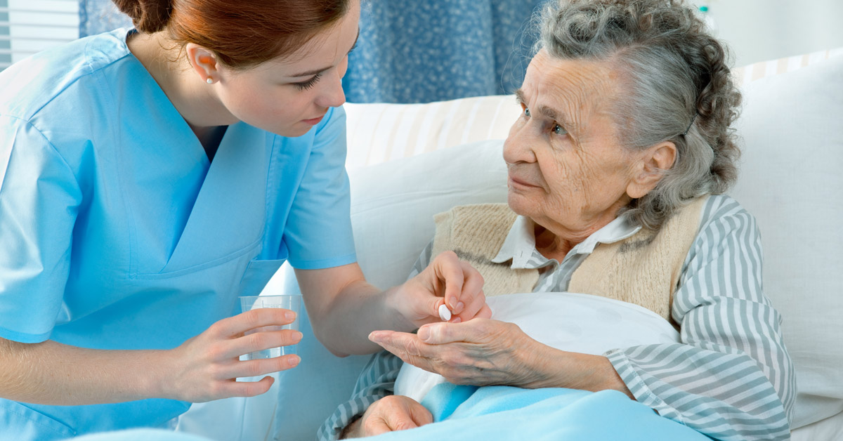 Nurse helping with medication
